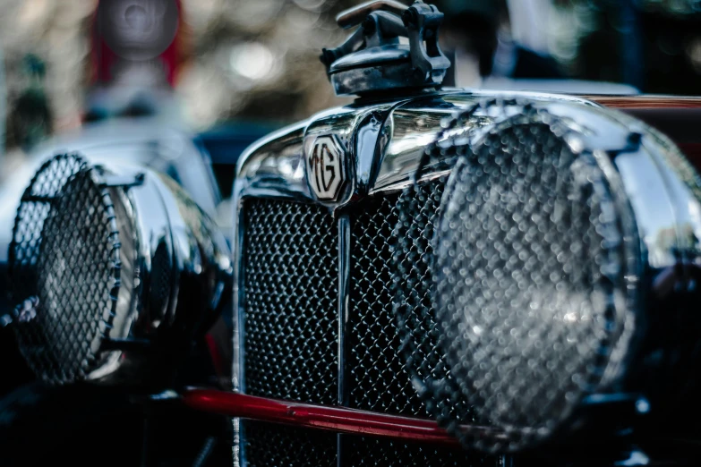 a close up of a chromed old fashioned fire hydrant