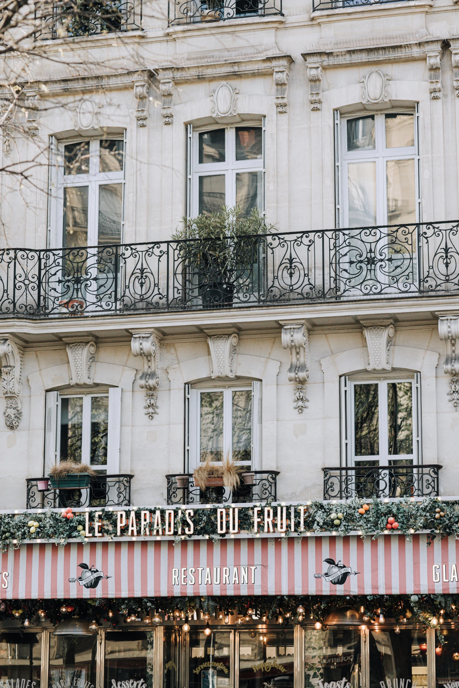 the facade of a large building with balcony balconies