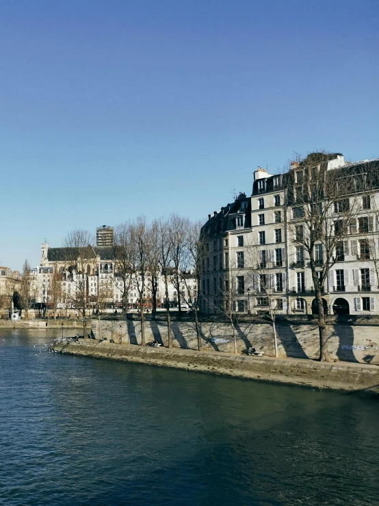 a bridge in a town over some water