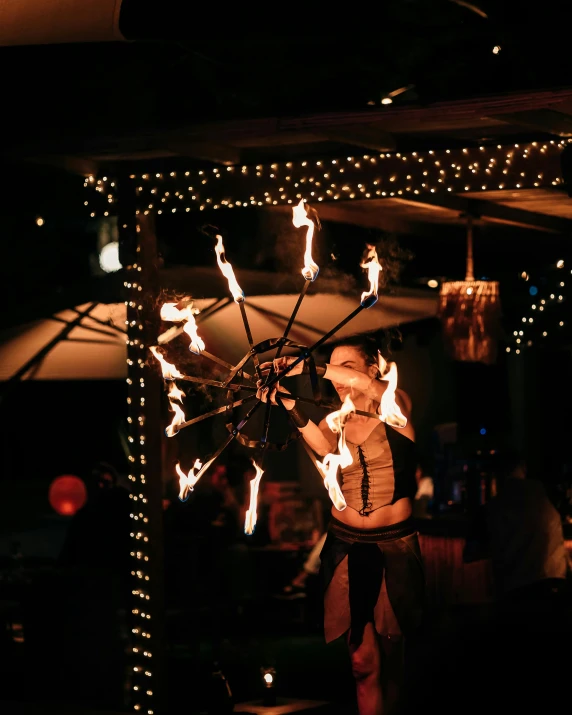 fire performers on stage during a performance