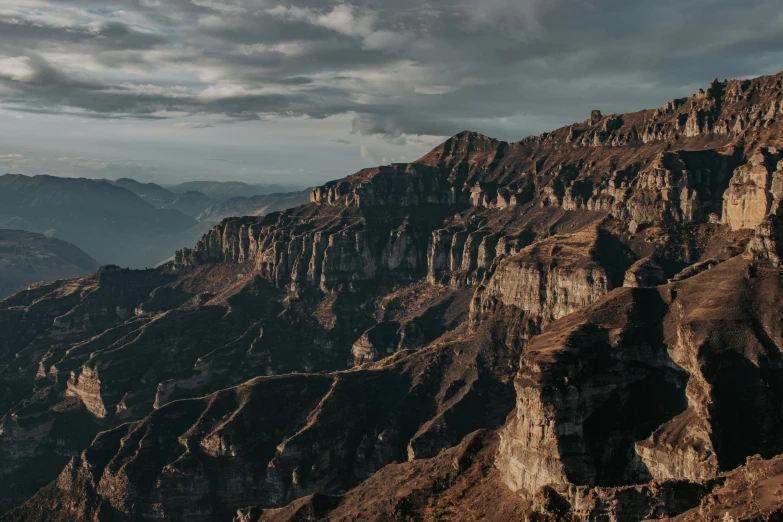 a group of mountains are seen in the distance