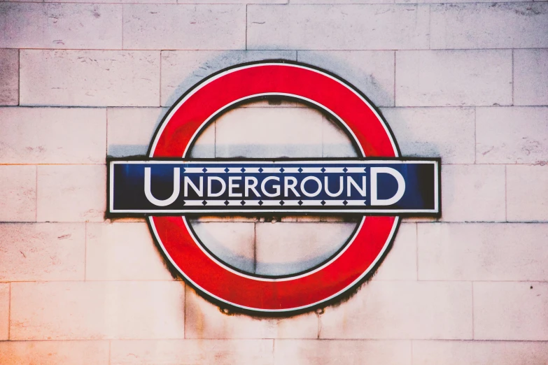 a close up of the sign for an underground subway