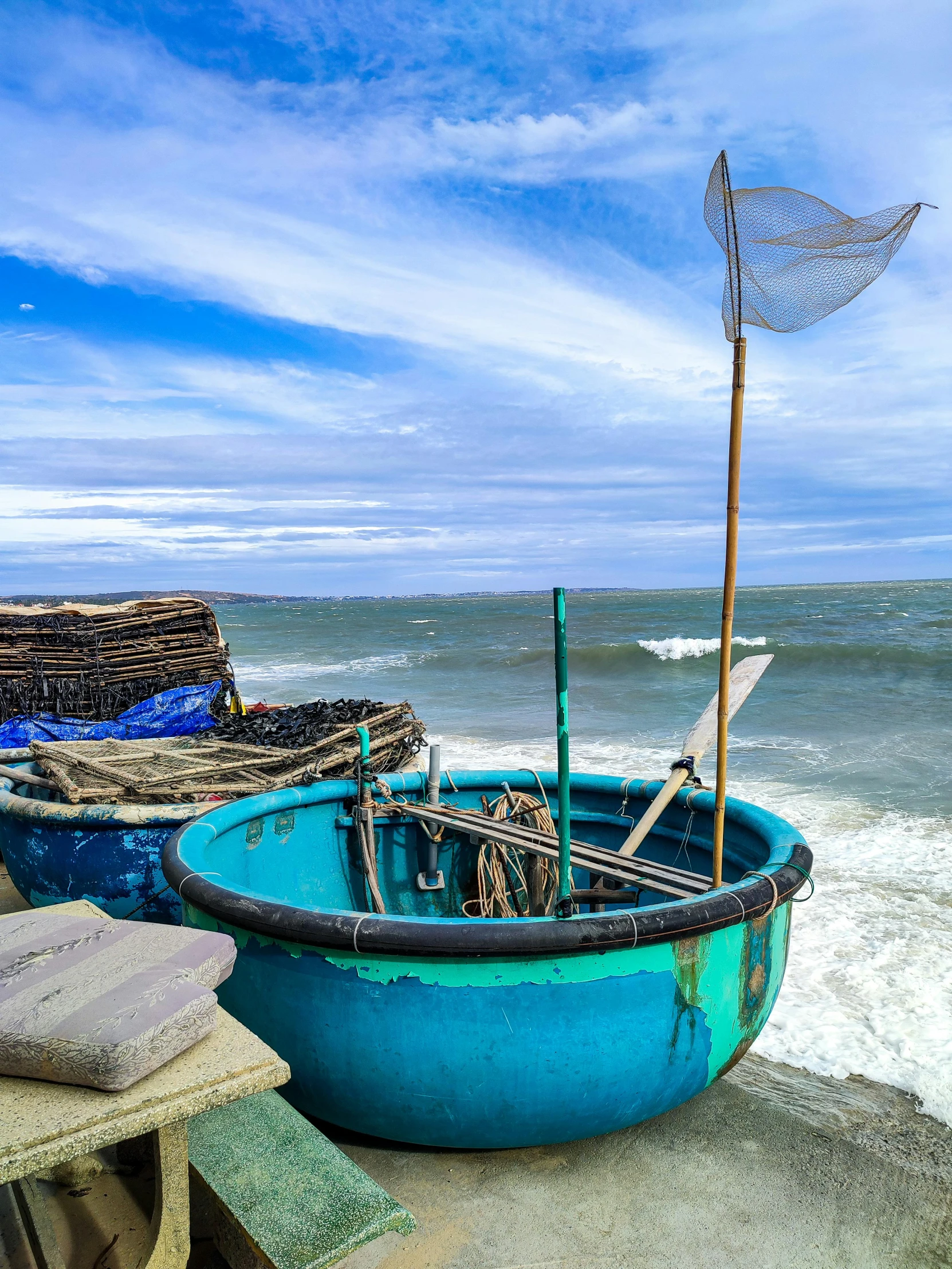 there are a couple boats that are by the beach