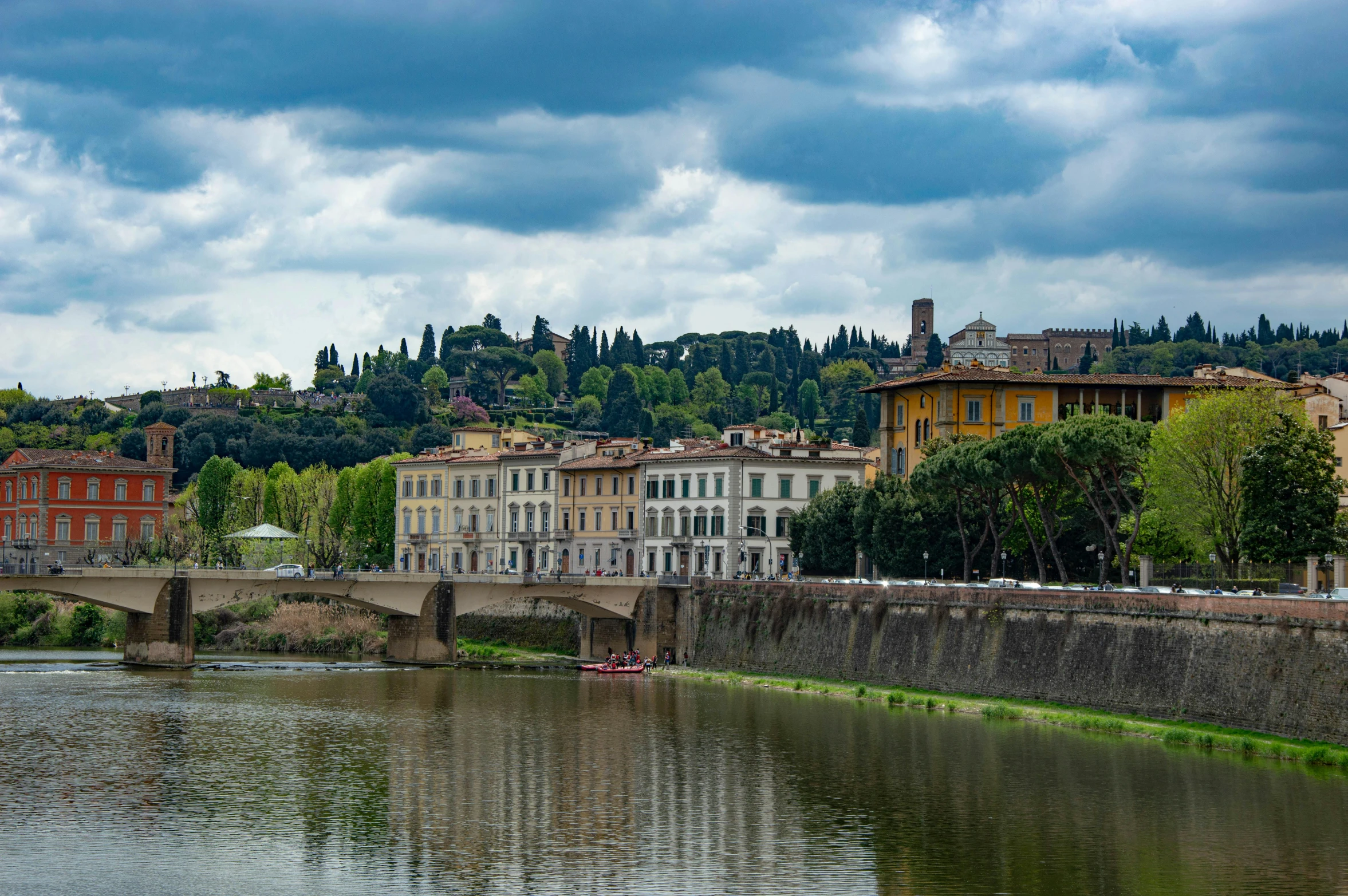 several houses on both sides of a waterway with water under it