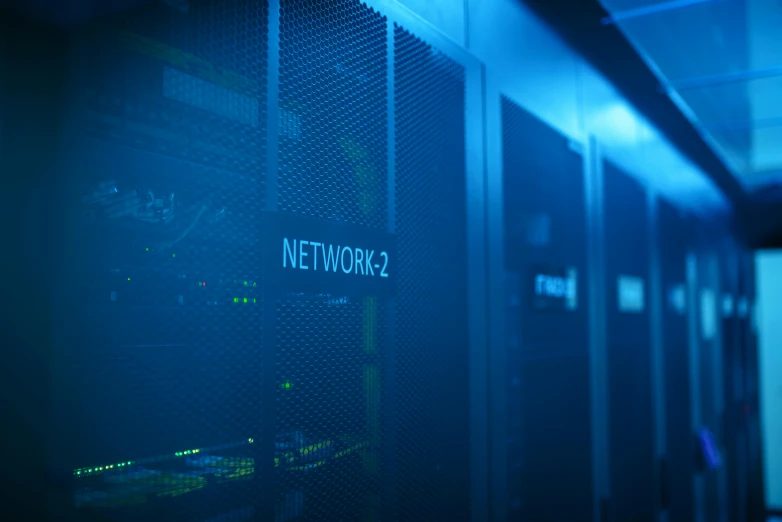 a blue and black network room that has a blue background