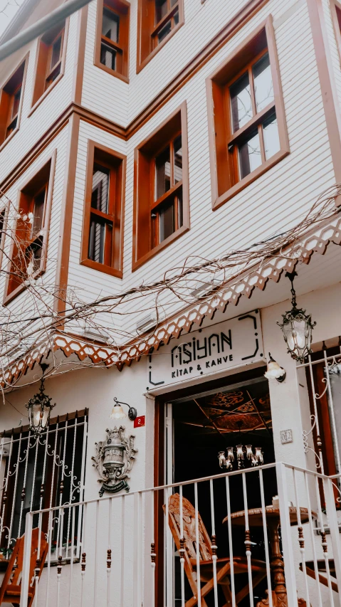 an image of a restaurant front with white paint