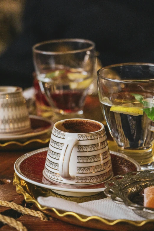 cups and saucers are shown on the table