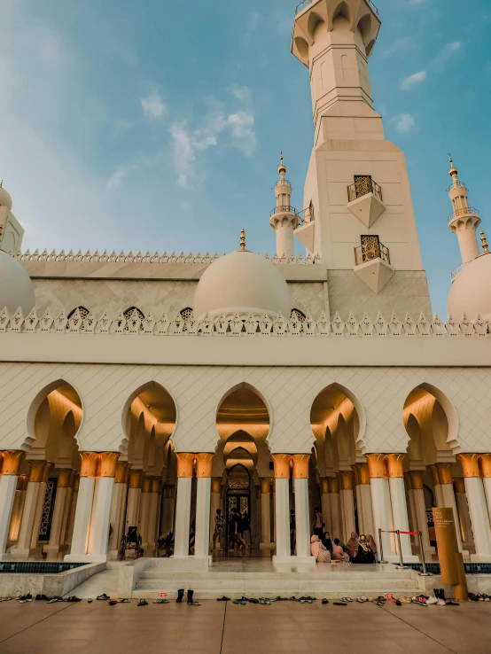 there is a tall building with many pillars and domes