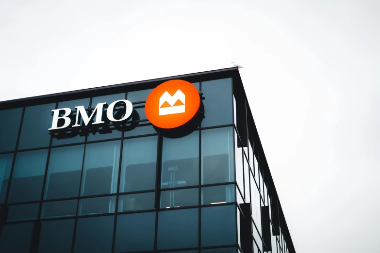 the bmo sign is on the glass side of the building