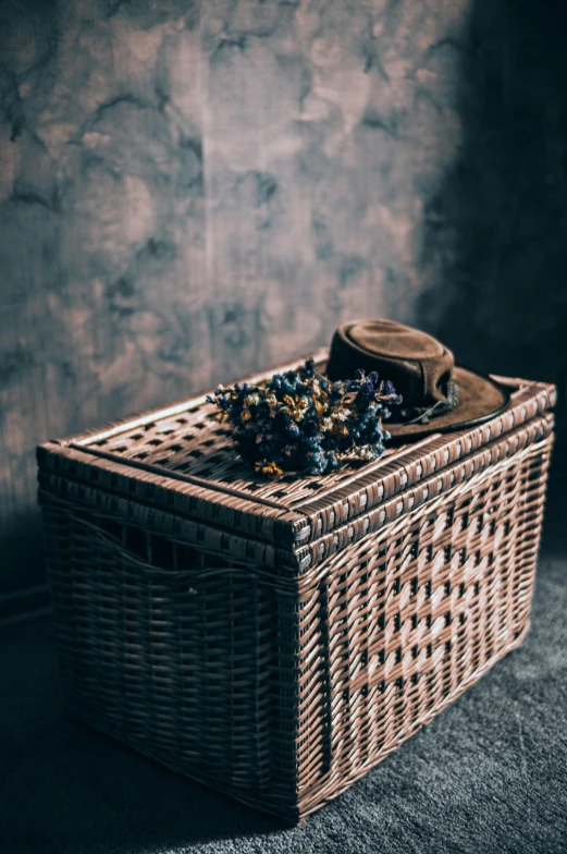 some sort of basket, which has been placed next to the wall