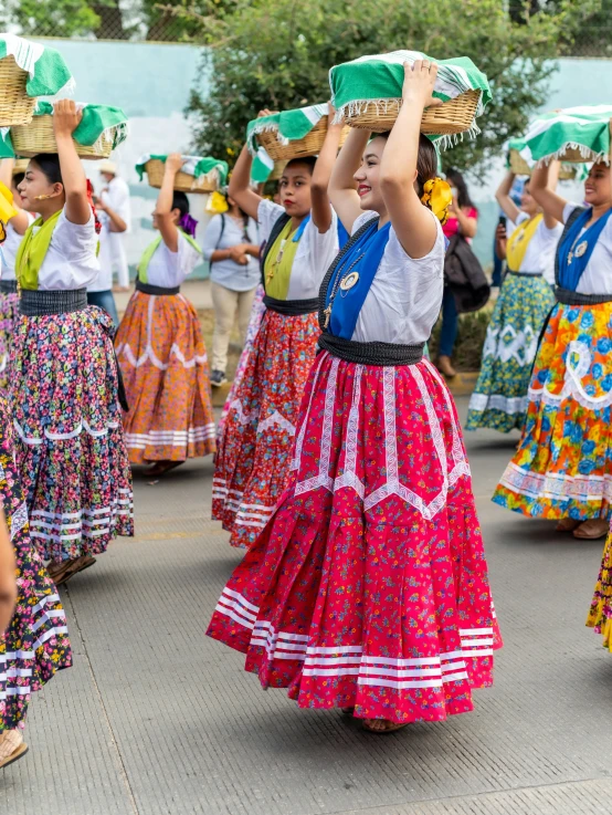 girls in a colorful skirt performing folk dance