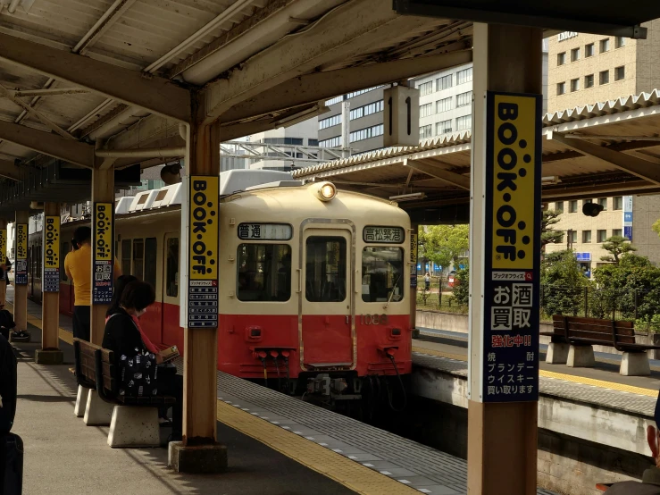 there are many people at the train station