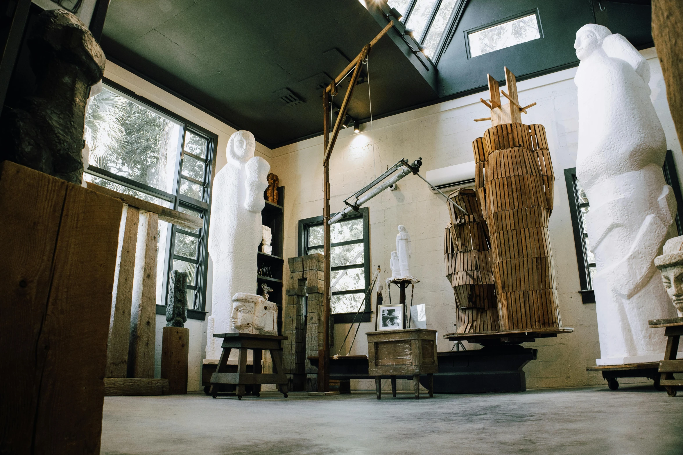 a room filled with huge columns and chairs