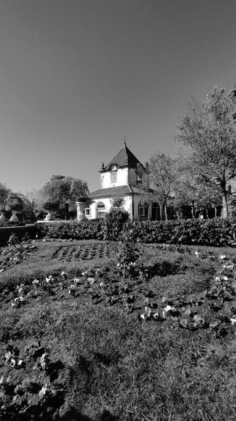 a black and white image of a big house
