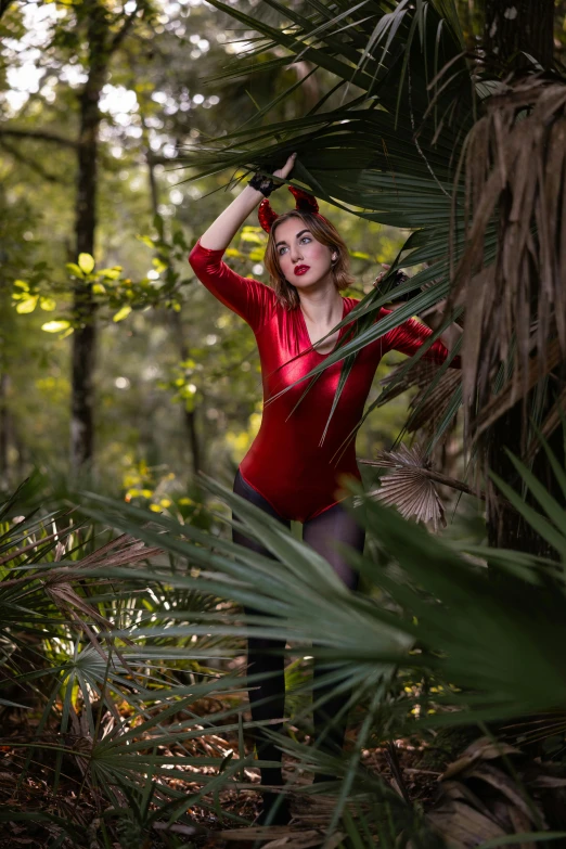 a woman wearing tight tight pants in the woods