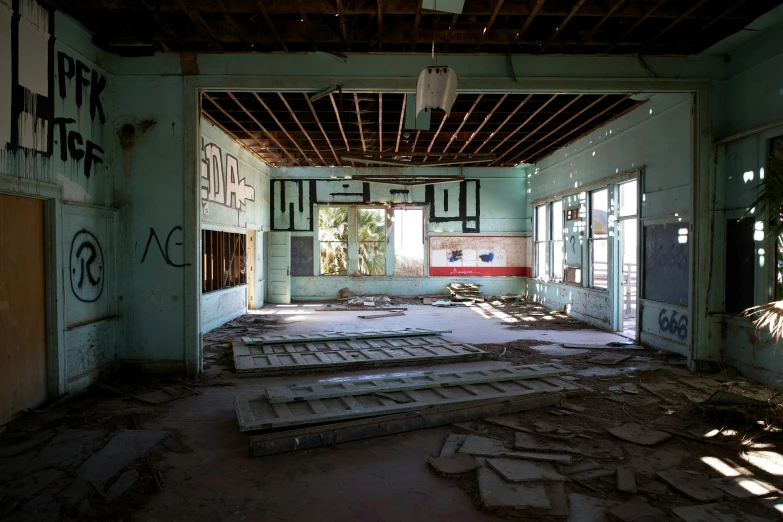 an abandoned building with a door open