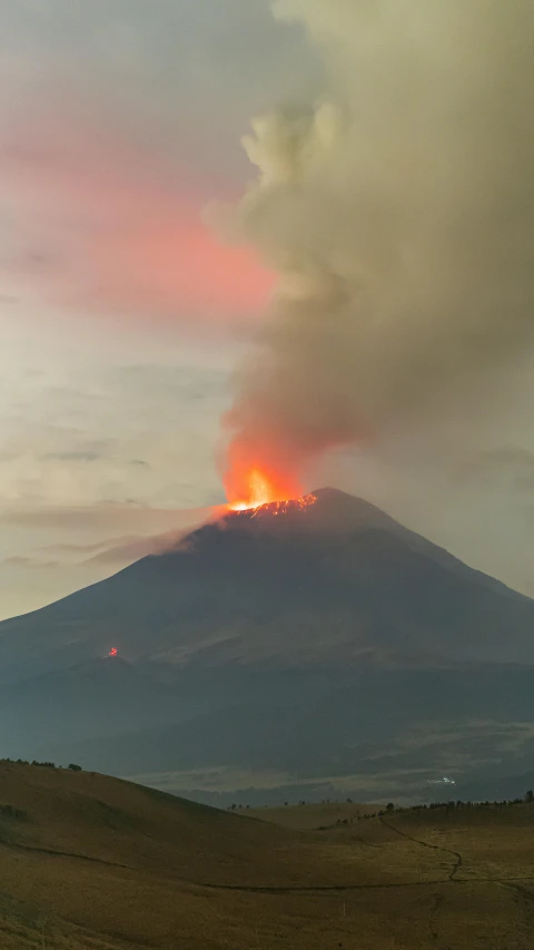 a po of a big, active volcano spewing smoke