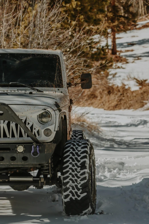 the jeep has snow tires on it's rims