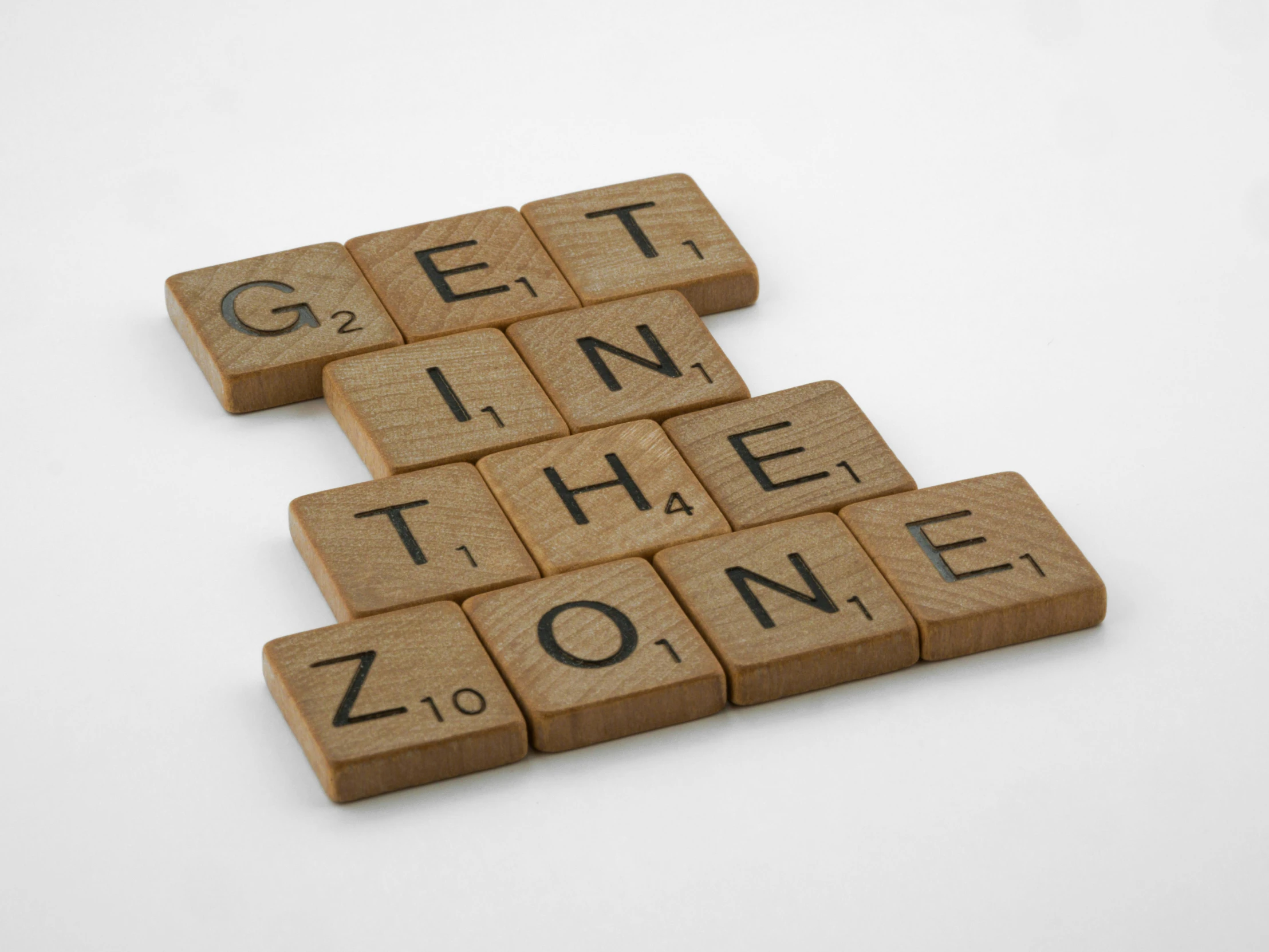 wooden block spelling out the phrase get in the zone