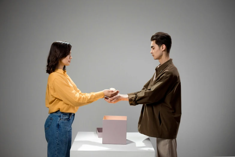 a couple of people shaking hands over a building