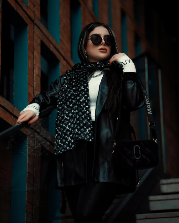 a doll is standing in front of some stairs and she's wearing glasses