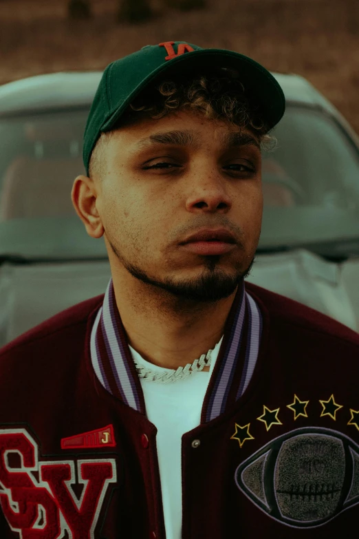 a man that is standing next to a car