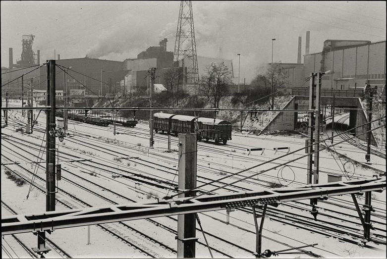 railroad tracks that are surrounded by buildings