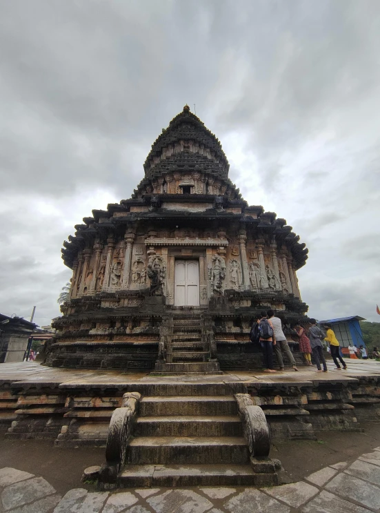 an old temple with many steps is being renovated