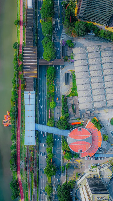 an aerial view of a parking lot and an outdoor stadium