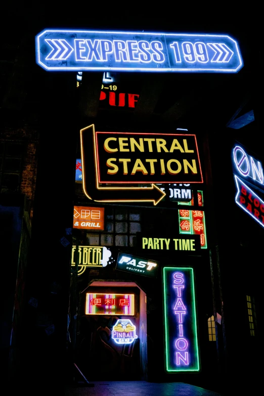 a large neon sign with different types and colors on it