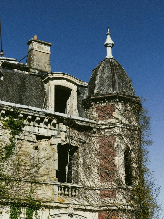 a very old building with some turrets and windows