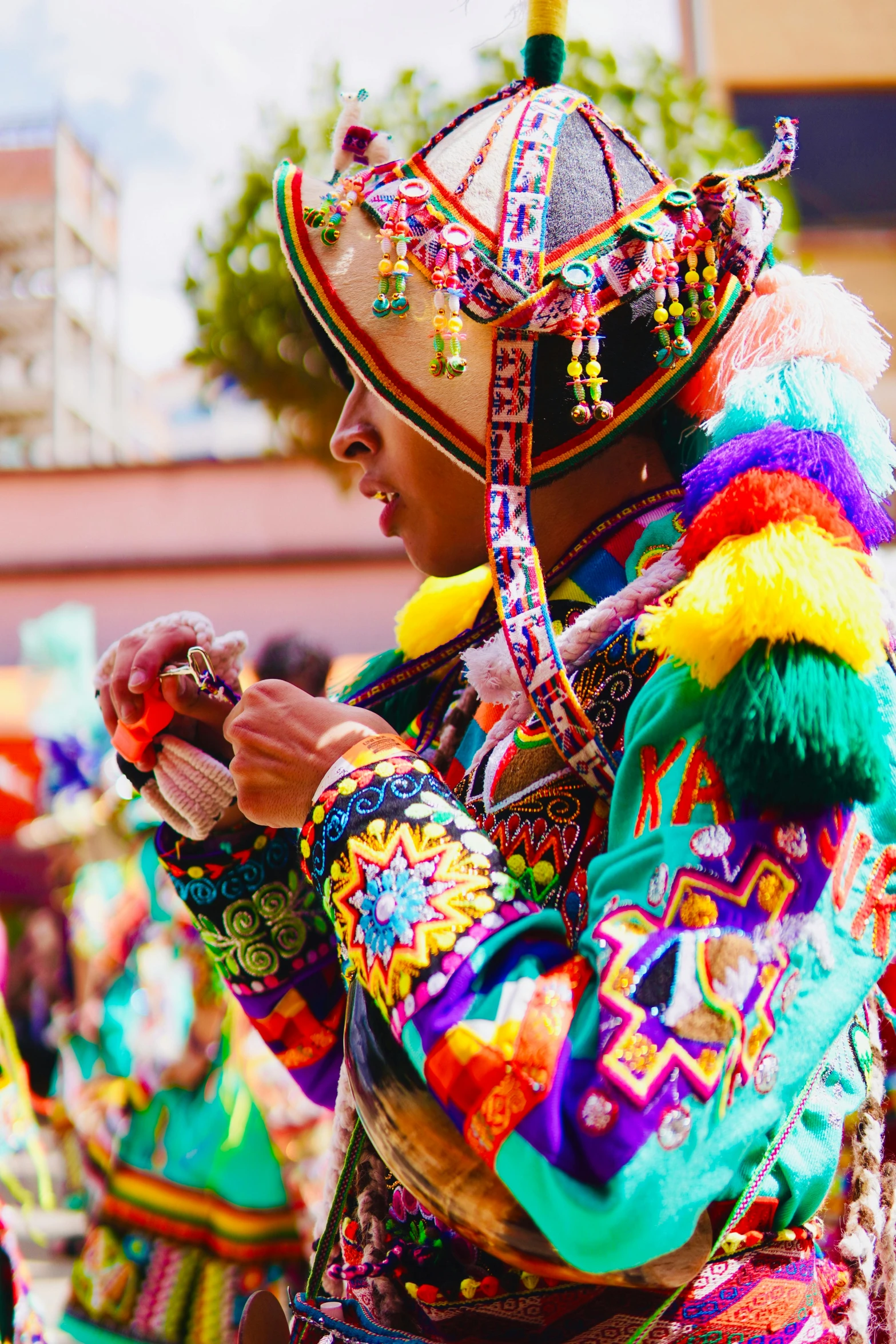 colorful people walking down the road with some cellphones