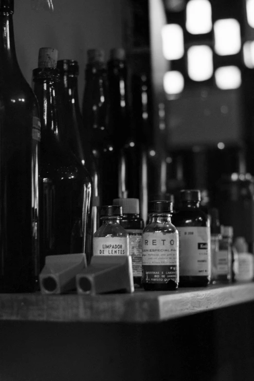 bottles are sitting on a table next to bottles