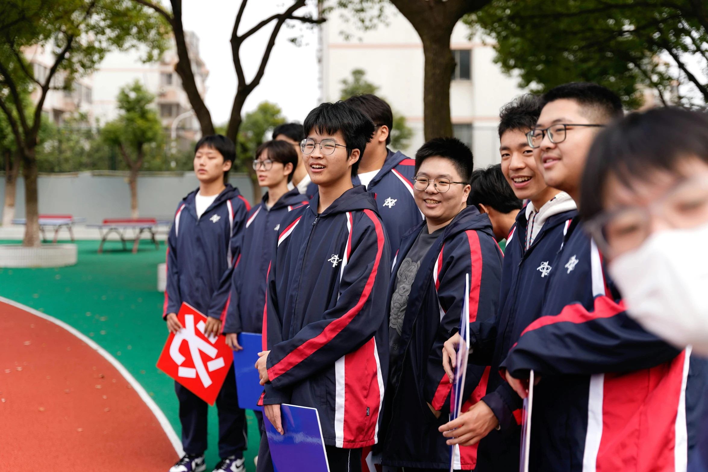 a group of men are posing for a po