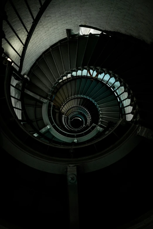 an aerial po taken of the inside of a spiral staircase