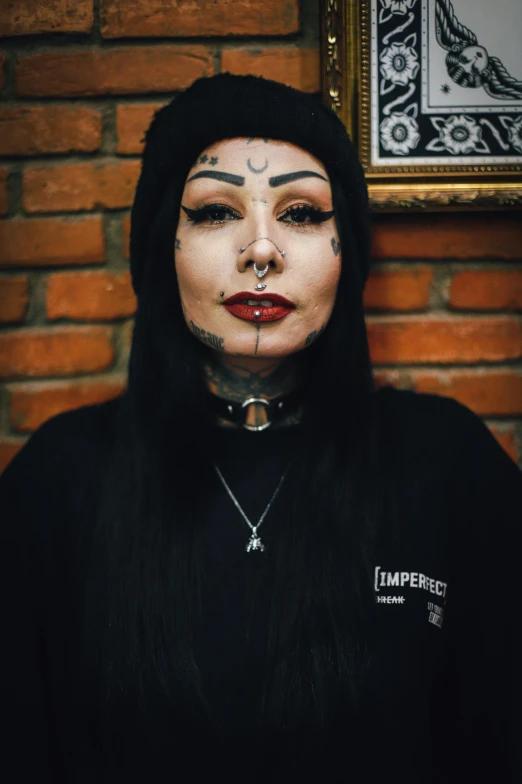 a woman with face paint and piercings