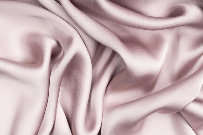 a pink fabric that has been partially folded