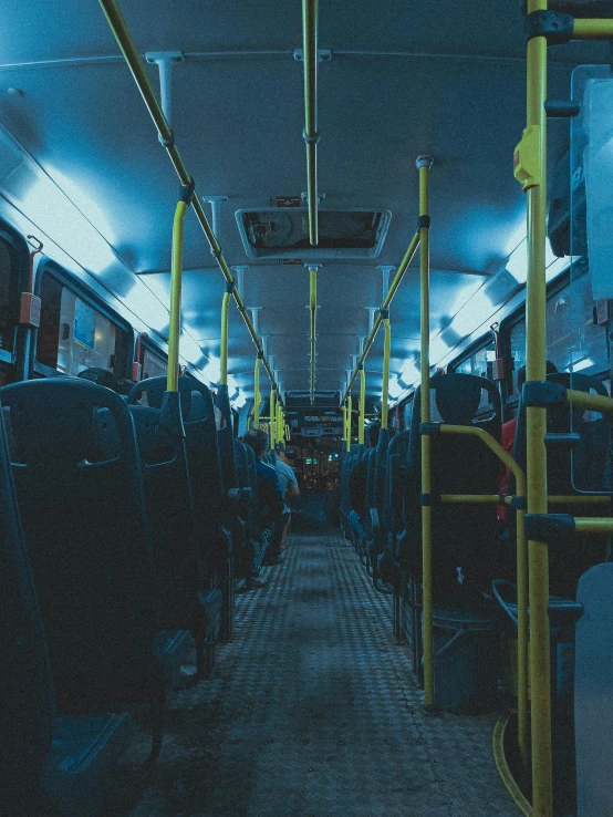 a dark blue picture of an empty train car
