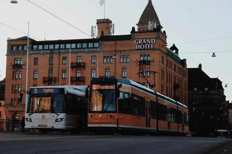 a passenger bus is shown parked on the street