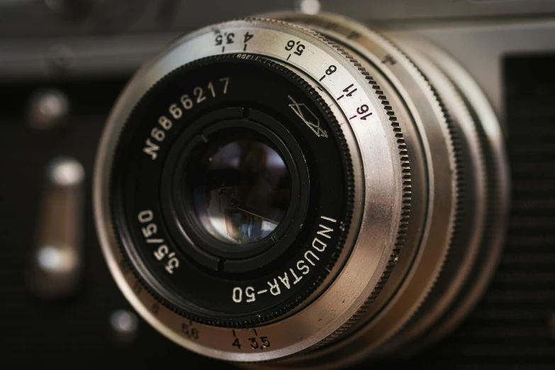 a close up of an old camera lens