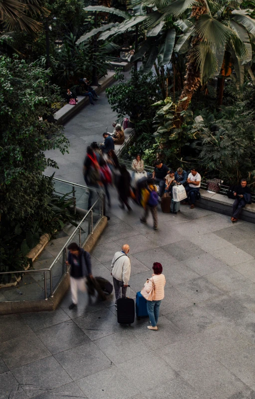 an image of people walking outside on a street