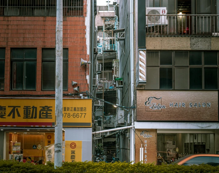 a city street in asia with multiple businesses