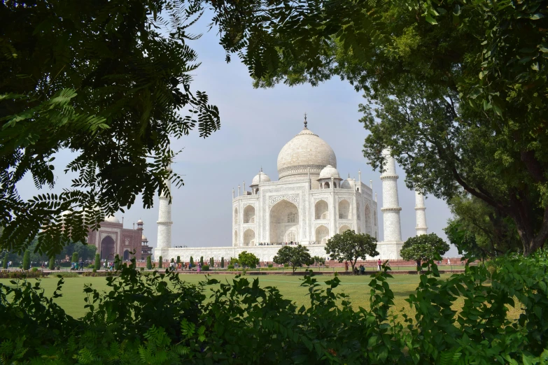 a large building in the middle of some trees