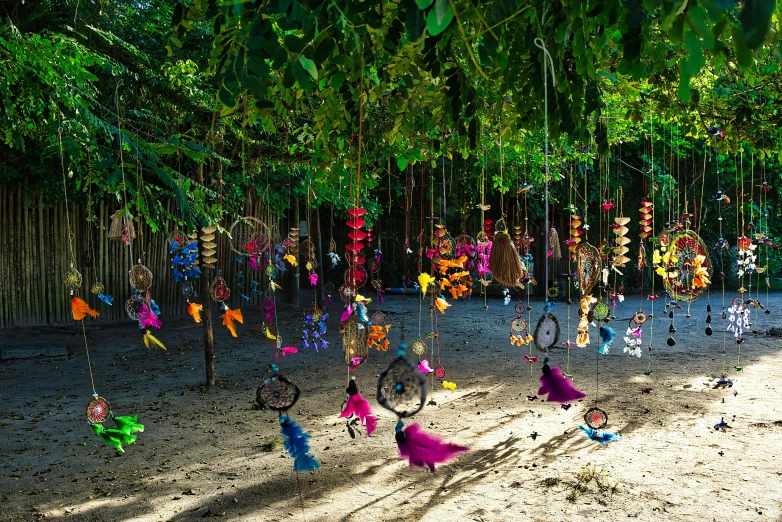 several children are playing with different colored decorations