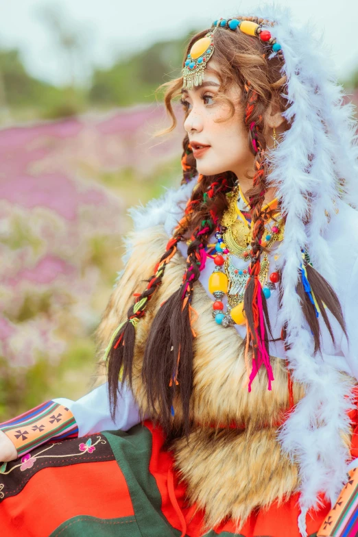 a girl with very long hair and an animal skin headdress