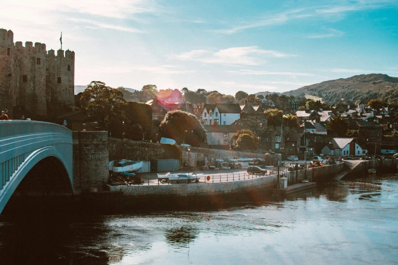 a bridge over the water and buildings below