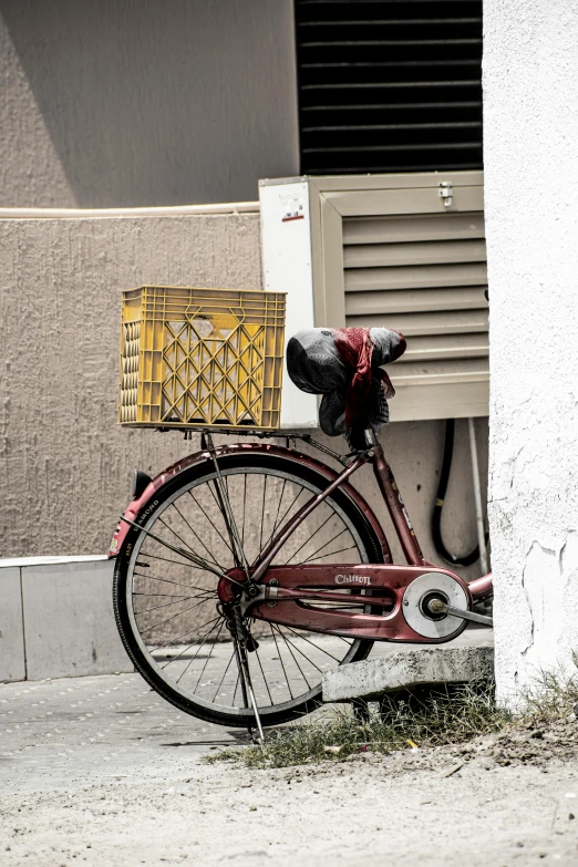 an old bicycle sitting next to the door