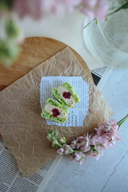 a couple of pieces of cake on top of a wooden  board