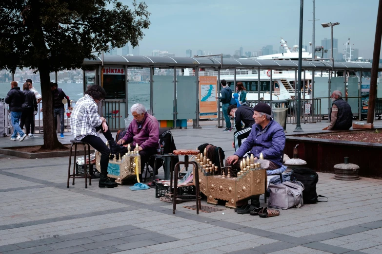 an image of a man sitting down by himself