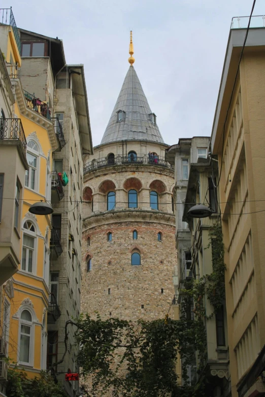 there is a building with a dome in the middle of buildings